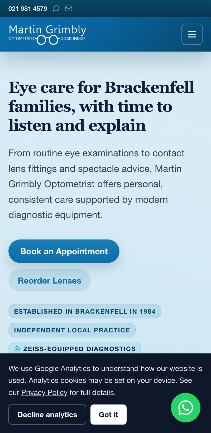 The rebuilt Martin Grimbly Optometrist website on a phone